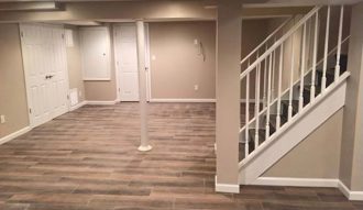 Basement with wood-look tile floor